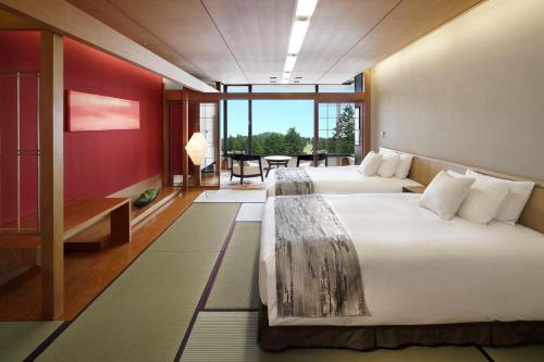Cama o camas de una habitación en Hakone Yunohana Prince Hotel