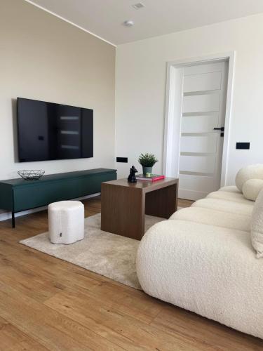 Μια τηλεόραση ή/και κέντρο ψυχαγωγίας στο Gemma Apartments