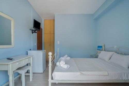 Ένα ή περισσότερα κρεβάτια σε δωμάτιο στο Giorgio studios-apartments 1
