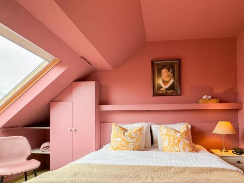 Postel nebo postele na pokoji v ubytování Hotel Botaniek