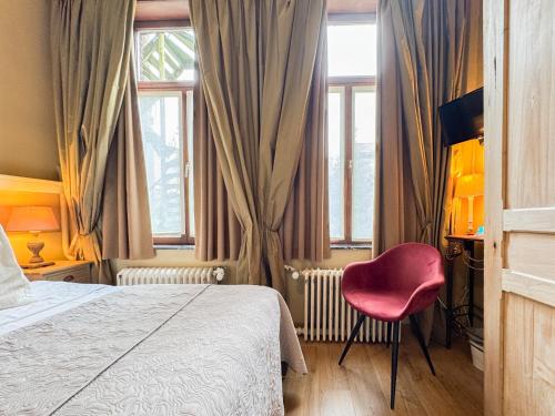 Postel nebo postele na pokoji v ubytování Hotel Botaniek
