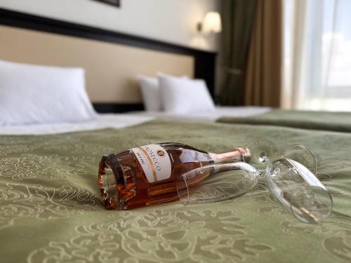 Кровать или кровати в номере Stadium Park Hotel