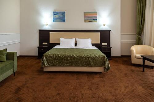 Кровать или кровати в номере Stadium Park Hotel