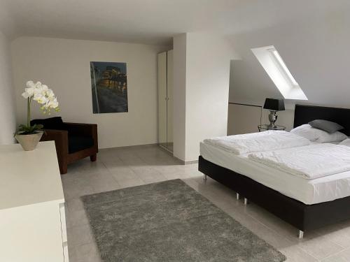 Ένα ή περισσότερα κρεβάτια σε δωμάτιο στο Rheinblick Apartments