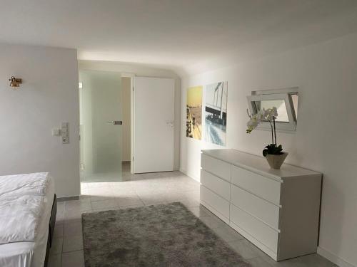 Ένα ή περισσότερα κρεβάτια σε δωμάτιο στο Rheinblick Apartments