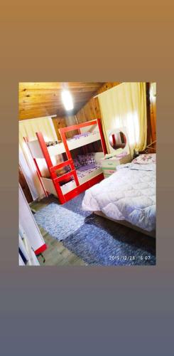 a bedroom with a bed and two bunk beds at Side Tuana Garden Home in Side