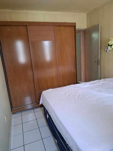 En eller flere senge i et værelse på APT COP 30 Residencial Itaoca Ananindeua