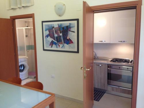 A kitchen or kitchenette at A casa di Alessia