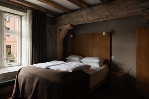 Postel nebo postele na pokoji v ubytování Hotel Brosundet