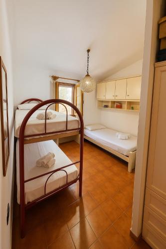 Giường trong phòng chung tại La Maison du Soleil
