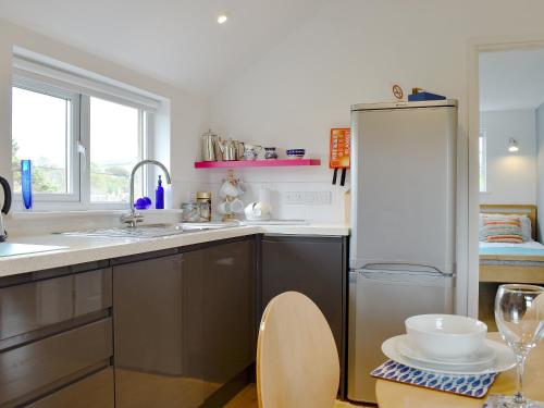 Kuchyň nebo kuchyňský kout v ubytování Purbeck Apartment