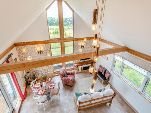 an overhead view of a living room with windows at Blackberry Barn in Maidstone