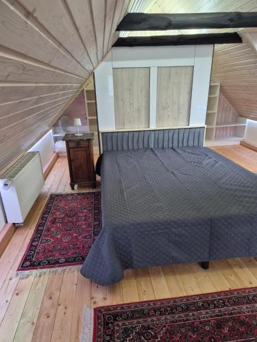 a bedroom with a bed in a room at Alte Schmiede in Oldenburg