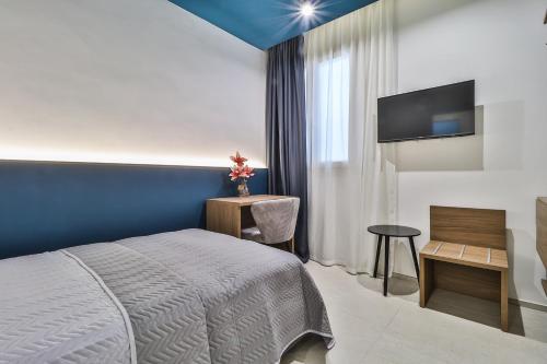 Ένα ή περισσότερα κρεβάτια σε δωμάτιο στο BeB Luxury Rooms