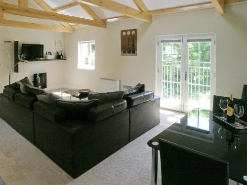 TV a/nebo společenská místnost v ubytování The Barn