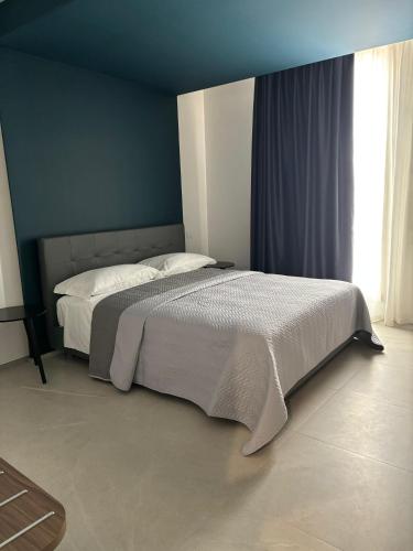 Ένα ή περισσότερα κρεβάτια σε δωμάτιο στο BeB Luxury Rooms