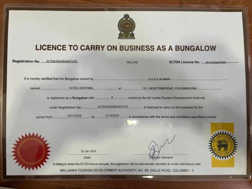 a certificate of licence to carry on business as a burnaby logo at Hotel Siyathma polonnaruwa in Polonnaruwa