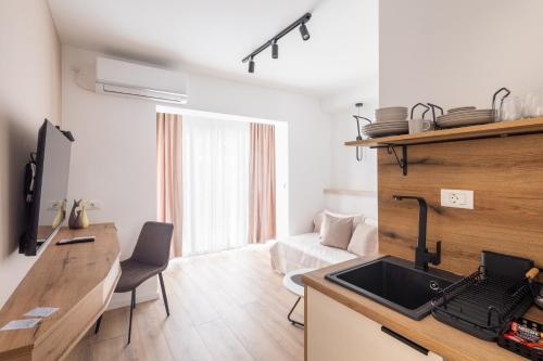 Η κουζίνα ή μικρή κουζίνα στο Apartments CityZen