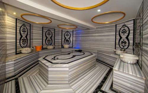 a bathroom with a bath tub in a room at Tilia Hotel in Istanbul