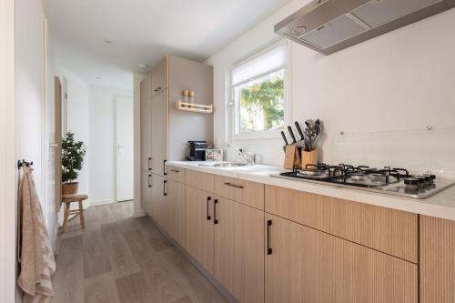 Dapur atau dapur kecil di Bosrijk Austerpark chalet 17
