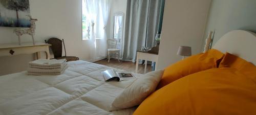 Postel nebo postele na pokoji v ubytování Maison La Thébaïde