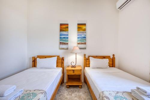 Voodi või voodid majutusasutuse Hgieri Holiday Home toas