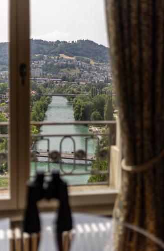 a view of a river from a window at Hotel Bellevue Palace Bern in Bern