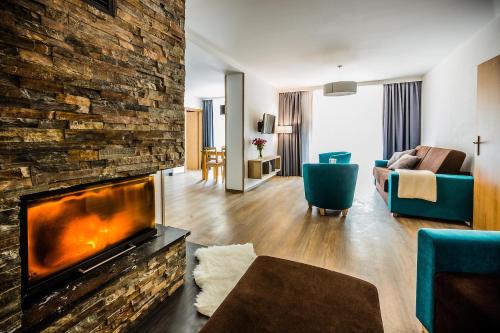 Posezení v ubytování Amenity Hotel & Resort Špindlerův Mlýn