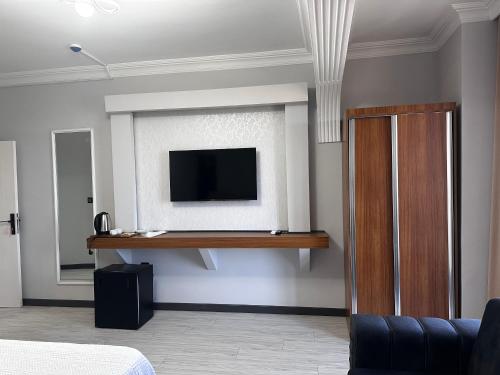 TV o dispositivi per l'intrattenimento presso KILIÇ MOTEL