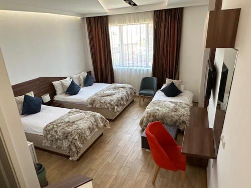 Una cama o camas en una habitación de Apel Luxury
