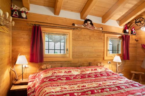 Postel nebo postele na pokoji v ubytování Chalet dei Cervi