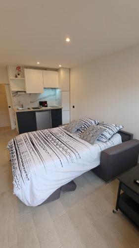 Llit o llits en una habitació de Studio moderne