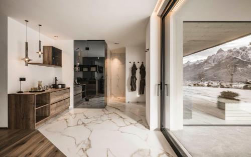 Ένα ή περισσότερα κρεβάτια σε δωμάτιο στο Enjoy Dolomites Apartment