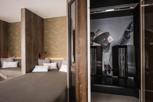 Ένα ή περισσότερα κρεβάτια σε δωμάτιο στο Enjoy Dolomites Apartment