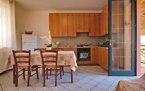 A kitchen or kitchenette at Le Magnolie Orchidea