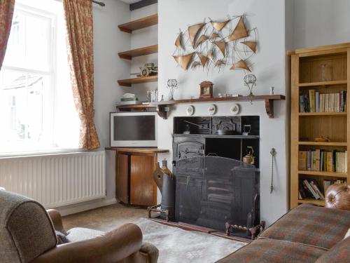 Et tv og/eller underholdning på Primrose Cottage