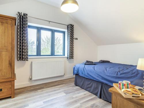 Ein Bett oder Betten in einem Zimmer der Unterkunft Fenside Way