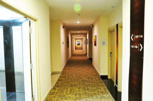 a hallway of a hospital with a long corridor at Valya Hotel, Ipoh in Ipoh
