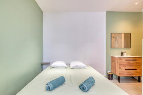 En eller flere senge i et værelse på L'élégance Urbaine - Villeurbanne - Proximité Lyon