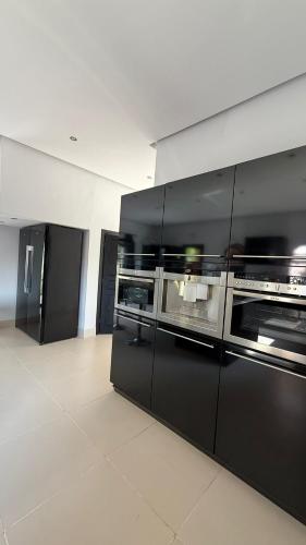 a kitchen with two toaster ovens at Villa Nourr in Marrakech