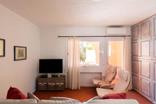 Телевизор и/или развлекательный центр в Cerbiatta al Molo Apartments by Wonderful Italy