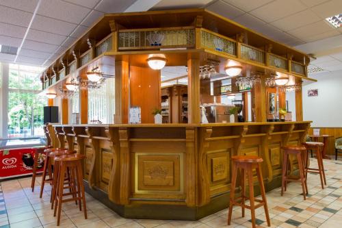 The lounge or bar area at Hotel Nostra