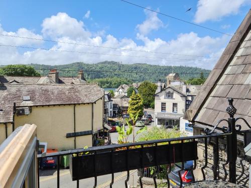 a view of a city from a balcony at Newfold Cottage in Bowness-on-Windermere