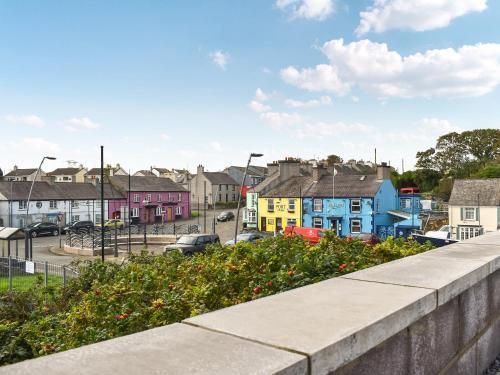 a view of a town with colorful houses at Wylandre in Amlwch