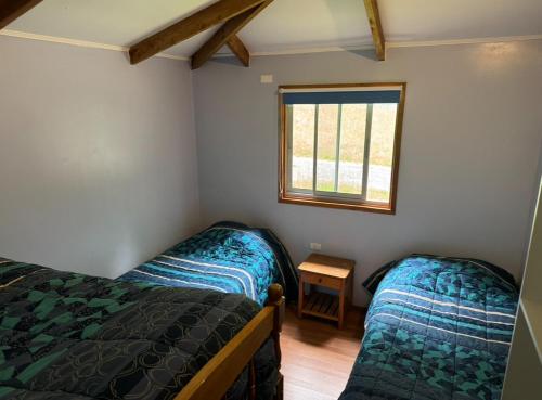 Postel nebo postele na pokoji v ubytování Lodge kumelka
