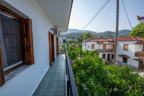 a balcony with a view of a building at Zisi's Home in Neo Klima