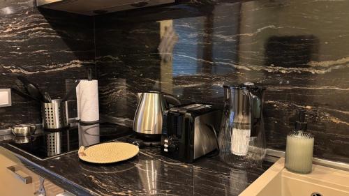 Cosy apartment 11Mins Centerにあるキッチンまたは簡易キッチン