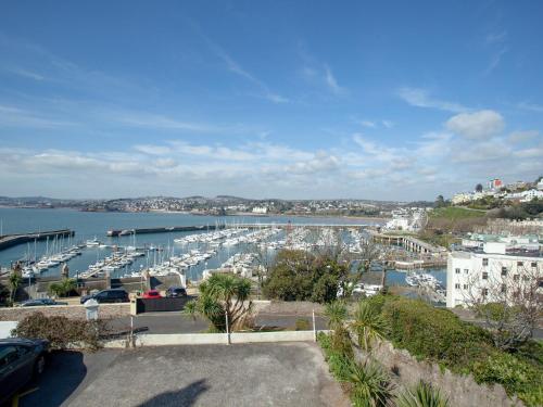 a view of a marina with boats in the water at Riviera View in Torquay