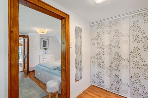 Postel nebo postele na pokoji v ubytování Ferienwohnung am Keschtebaum, 70qm