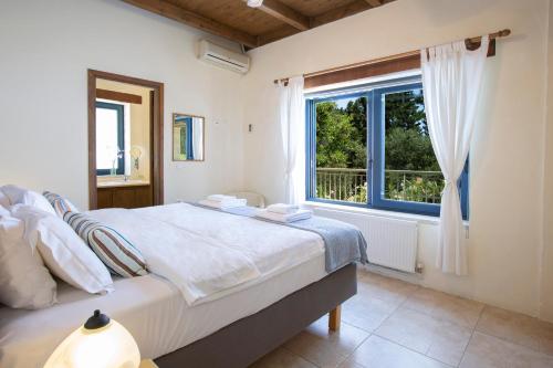 Ένα ή περισσότερα κρεβάτια σε δωμάτιο στο Villa Anlys